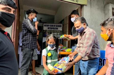 Food & stationeries distribution to needy children at (Nav Yubak Brinda Club , Santoshinagar , siliguri),supported by : RI.Dist.3240 food bank