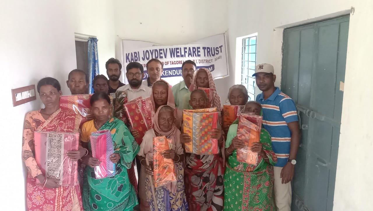 Distribution of New Sari by RC Tagoreland to poor and needy Adibasi women at Joydeb, under Joydeb Welfare Trust (RCC) on 30.09.22