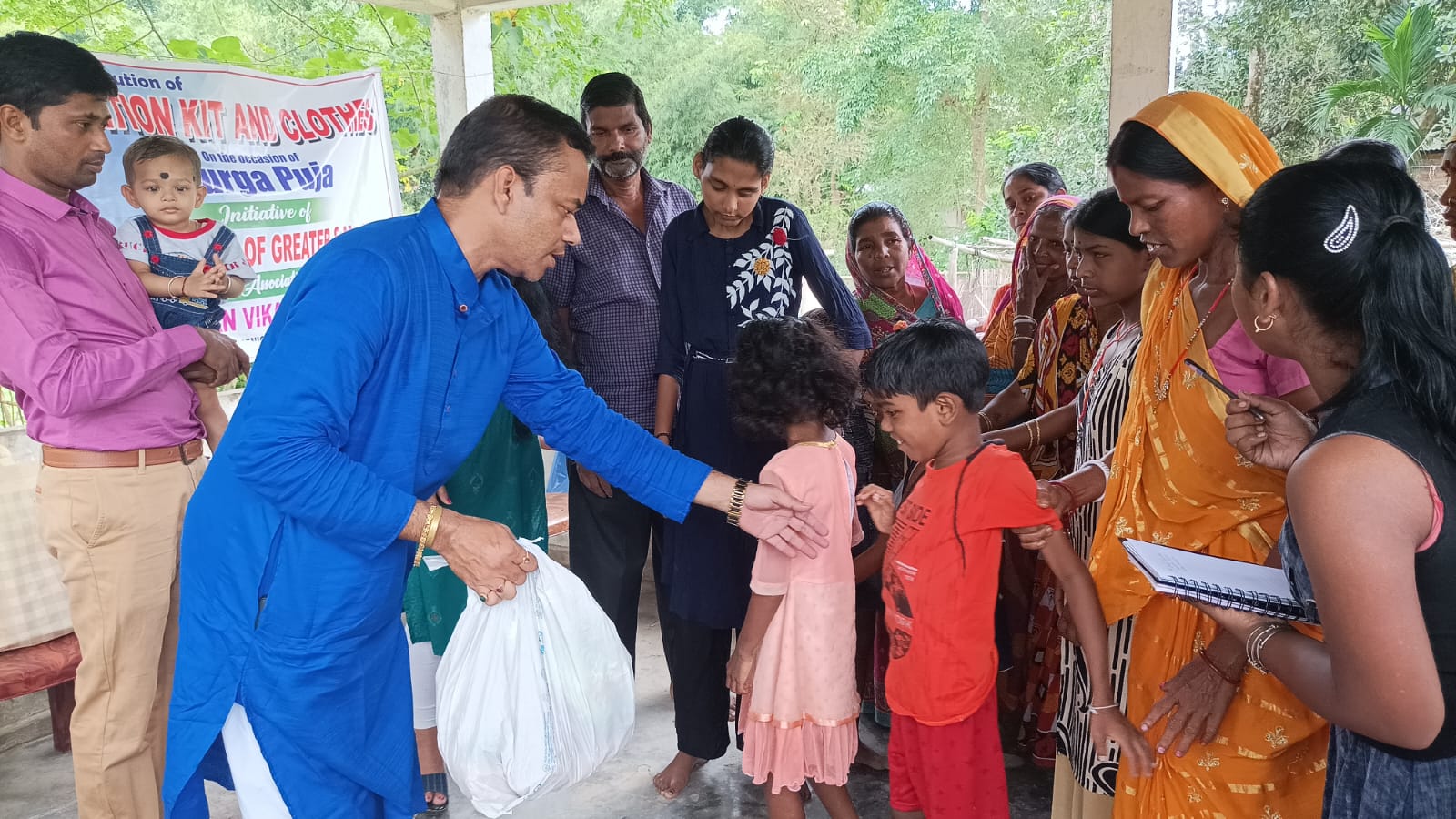 Distribution of Clothes and Ration Kits