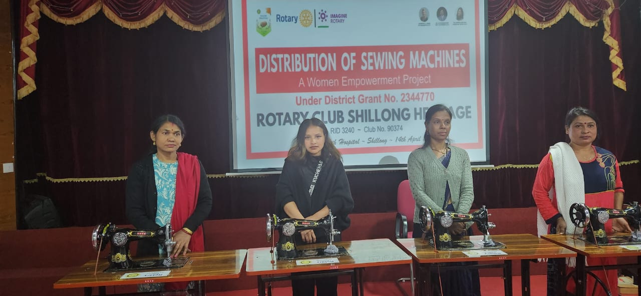 Distribution of sewing machines under District Grant
